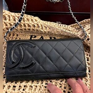 Authentic Chanel Cambon wallet with an unbranded chain.